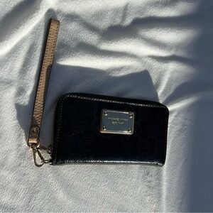 Michael Kors Black and Gold wristlet